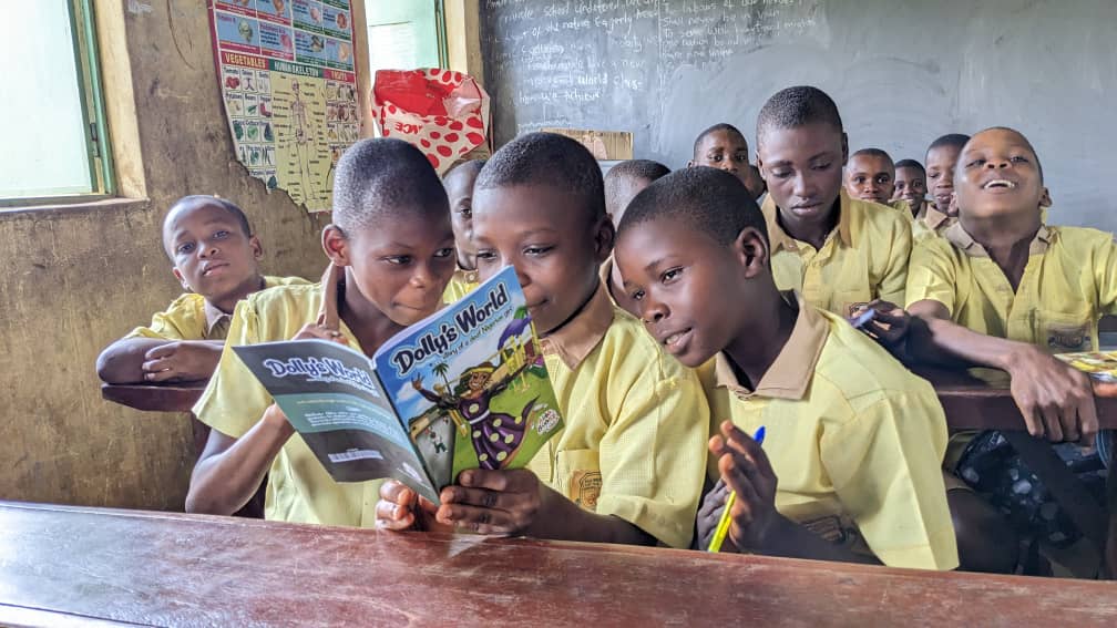 Child reading an inclusive book with braille overlay